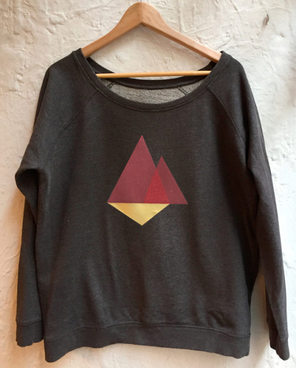 Sudadera bordada con diseño de triángulos abstractos